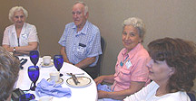 Several people gathered around a table