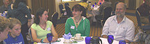Several more members chatting at another table