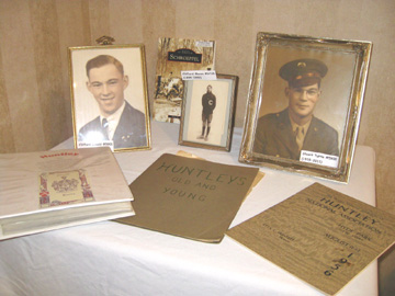 Table with photos and genealogical books