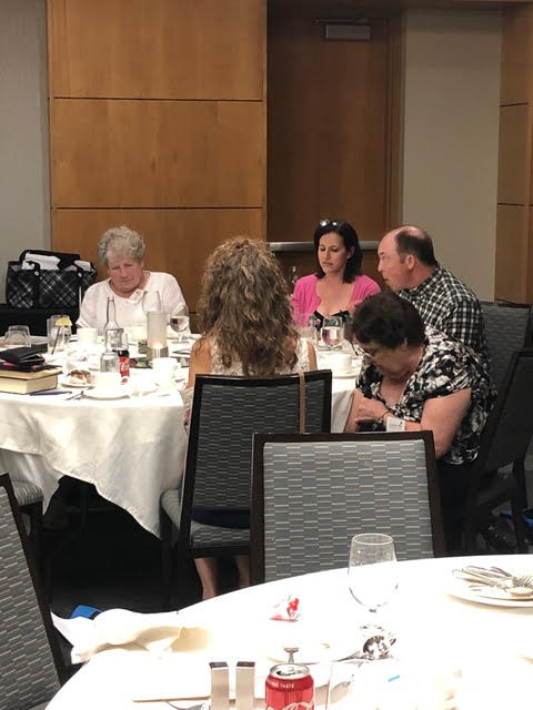 4 people at table